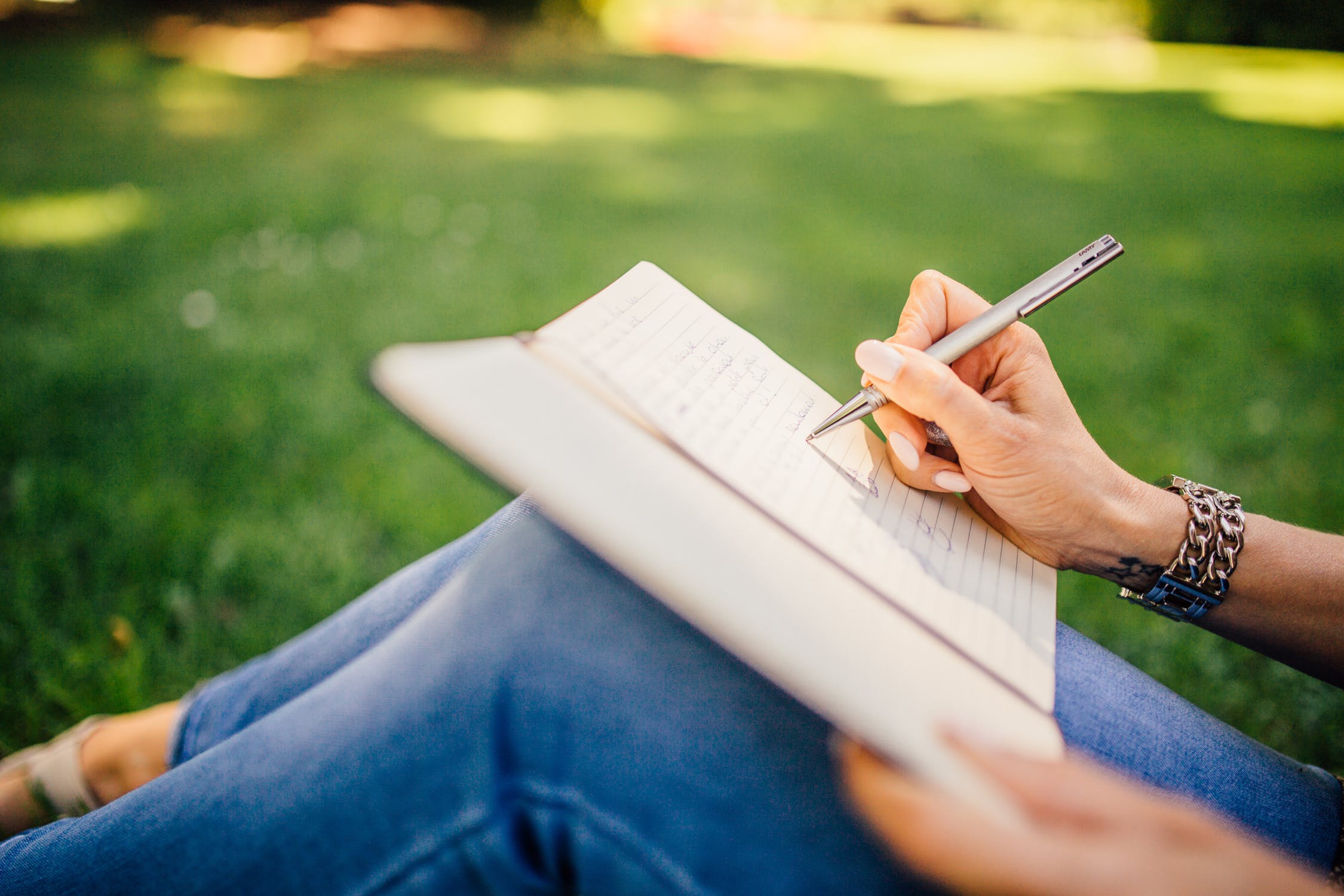 Woman writing in a notebook